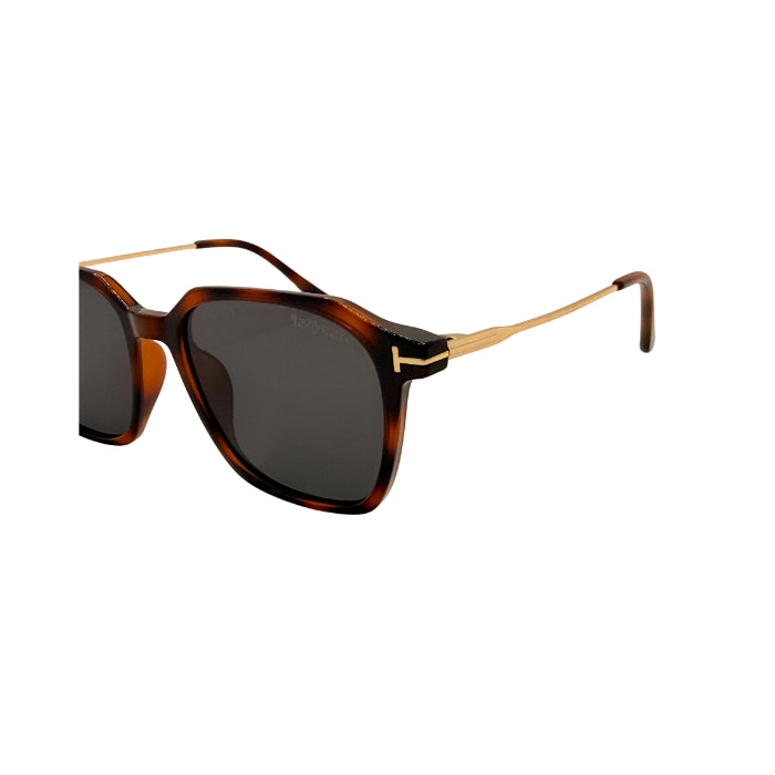 Sunglasses with tortoiseshell frame and dark lenses on a white background