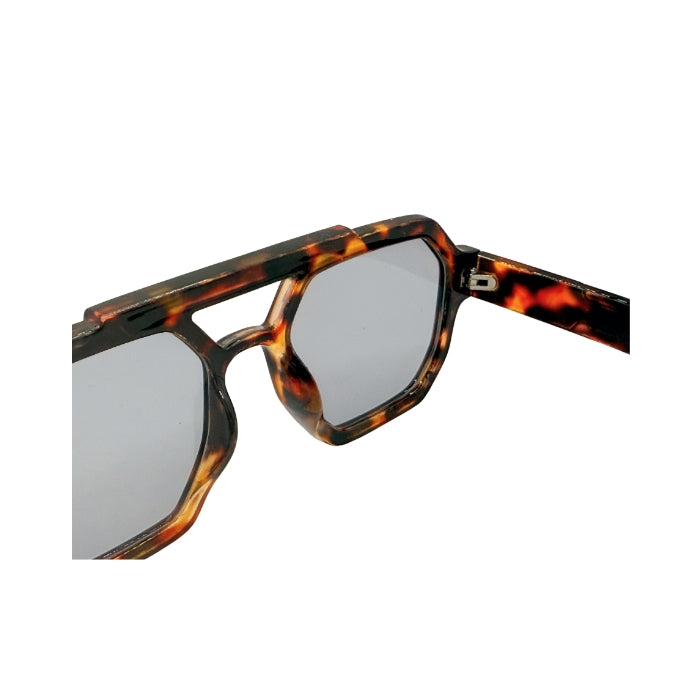 Sunglasses with tortoiseshell frame and reflective lenses on a white background
