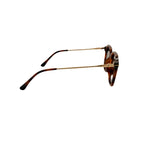 Sunglasses with tortoiseshell frame on a white background