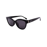 Sunglasses with black frames and gold and white design on side on white background
