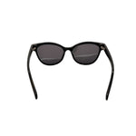 Sunglasses with black frames and dark lenses on white background
