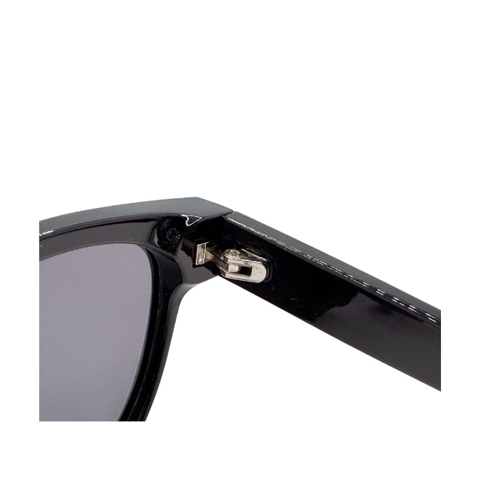 close up of black sunglasses showing hinge details