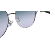 Close-up of a pair of sunglasses with gradient lenses on a white background