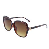 Sunglasses with tortoiseshell frame and brown gradient lenses on a white background