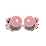 Pink sunglasses with cartoon character lenses on a white background