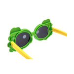 Back side of yellow and green kids sunglasses on white background