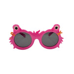 Pink sunglasses with a fish design on a white background