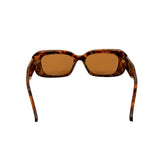 Sunglasses with tortoiseshell frame and brown lenses on a white background