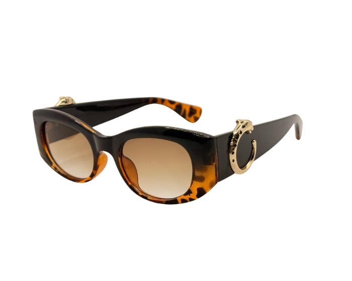 Sunglasses with tortoiseshell frame and brown lenses on a white background