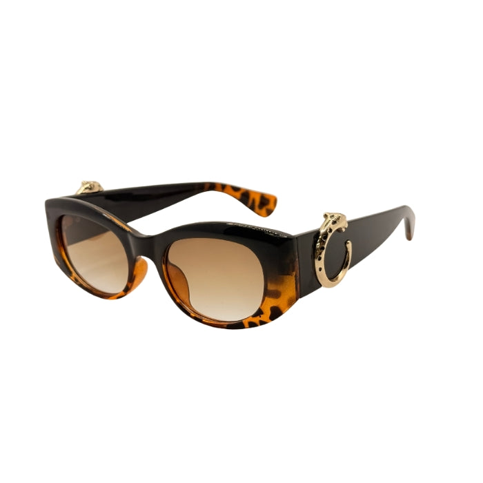 Sunglasses with tortoiseshell frame and brown lenses on a white background