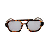 Sunglasses with tortoiseshell frame and reflective lenses on a white background