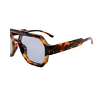 Sunglasses with tortoiseshell frame and reflective lenses on a white background