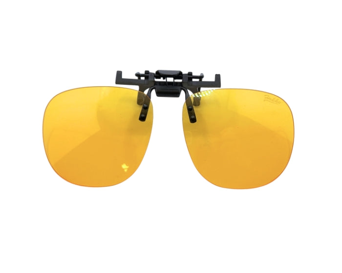 Yellow sunglasses with a black clip on a white background